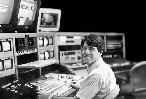 Steve Falcon at console of Hewlett Packard's Cupertino Teleclass factility.